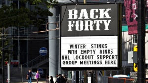 A pub near the home arena of the NHL Vancouver Canucks posts a sign in regarding the current league and players dispute in Vancouver